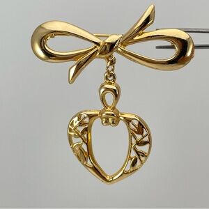 Charming Vintage Gold-Tone Bow & Heart Dangle Brooch with Leaf Detail.